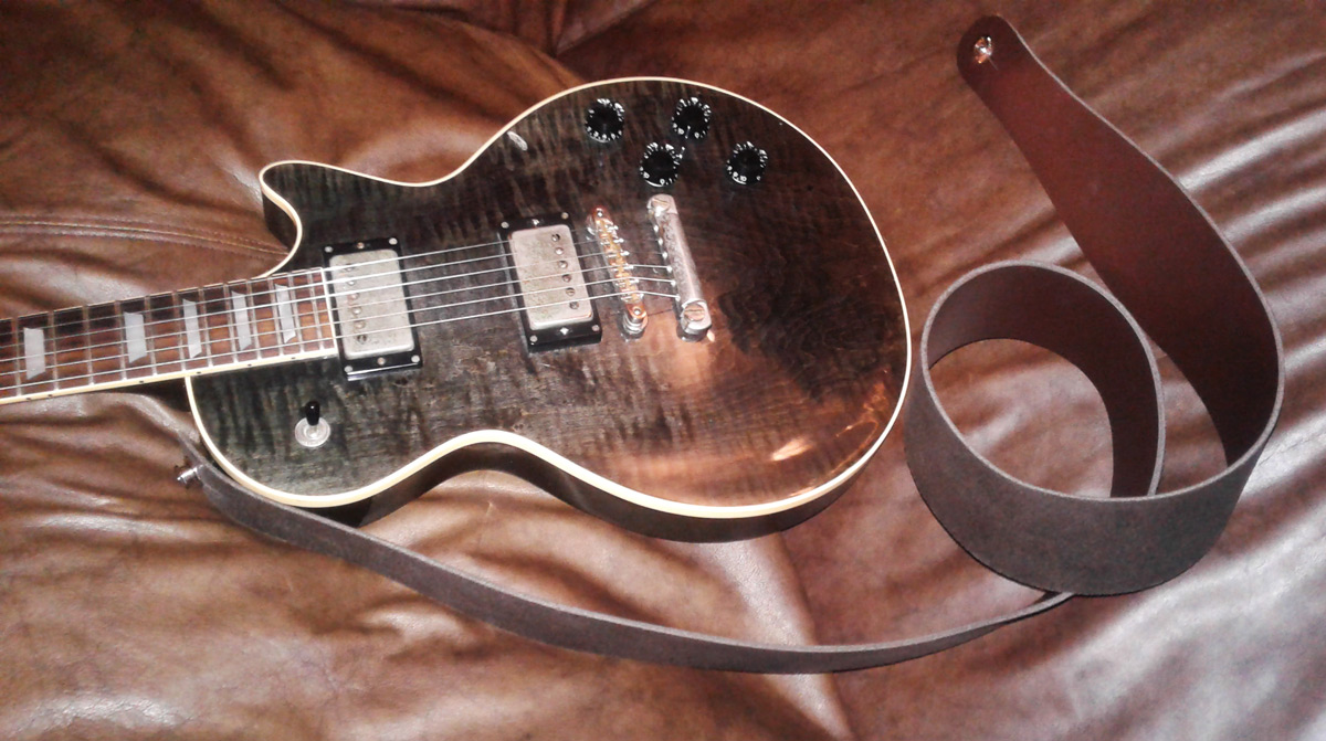 Show me your Les Paul and the strap you're using with it. Page 2